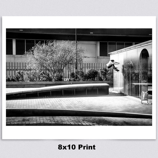Evan Smith, kickflip wallride off glass building facade, Barcelona 2015, black and white — fine art skate photography print by David Broach