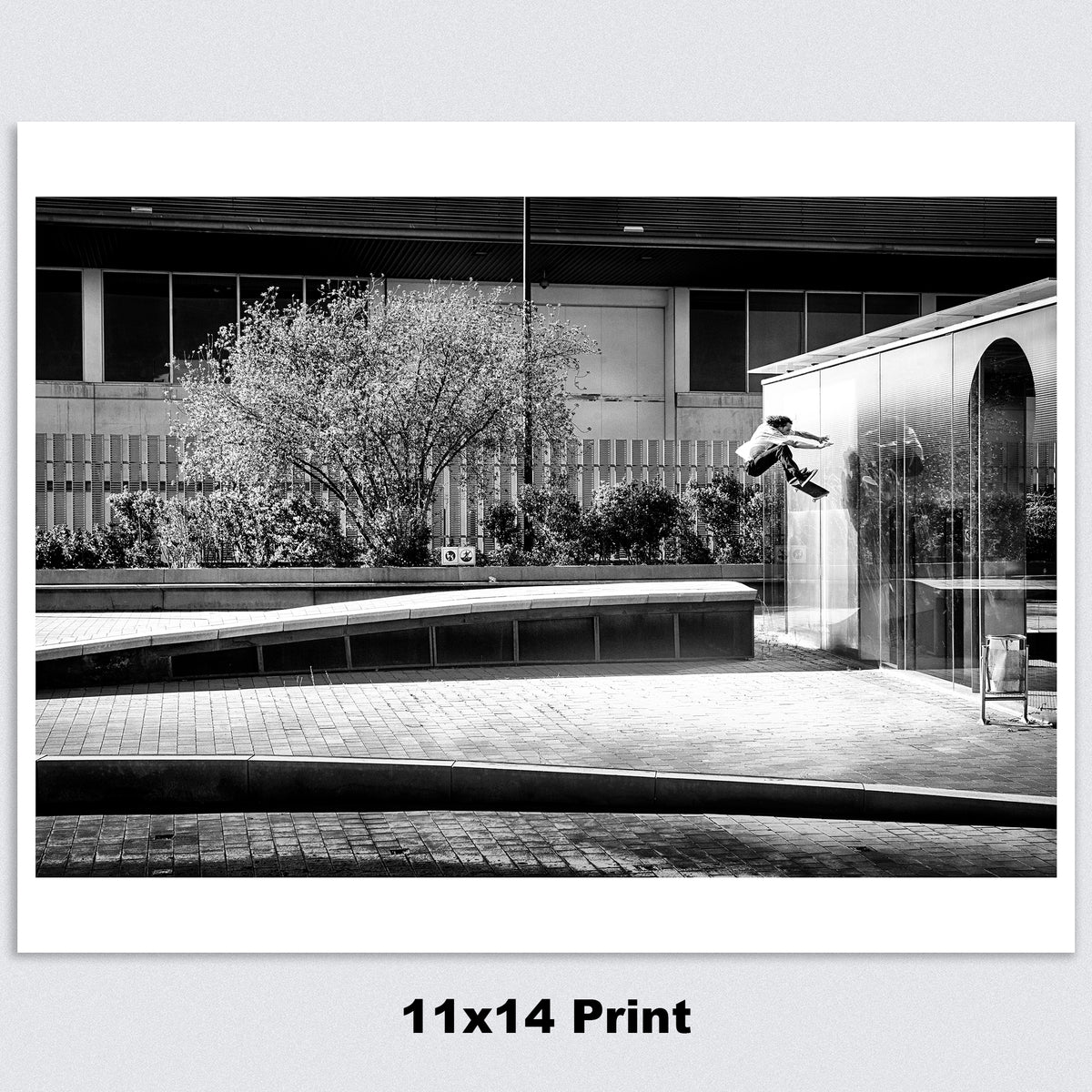Evan Smith, kickflip wallride off glass building facade, Barcelona 2015, black and white — fine art skate photography print by David Broach